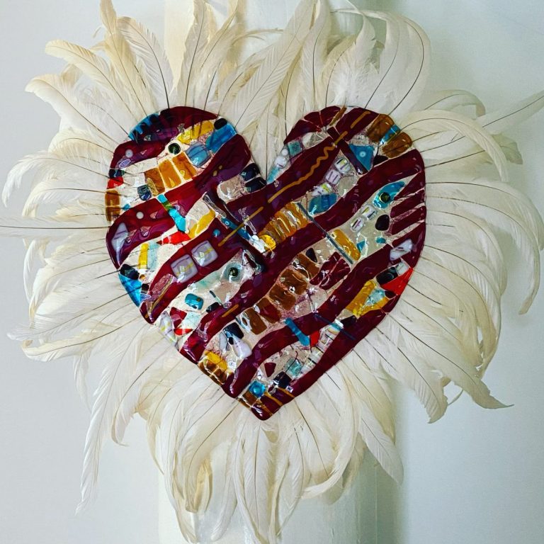 heart with rooster feathers